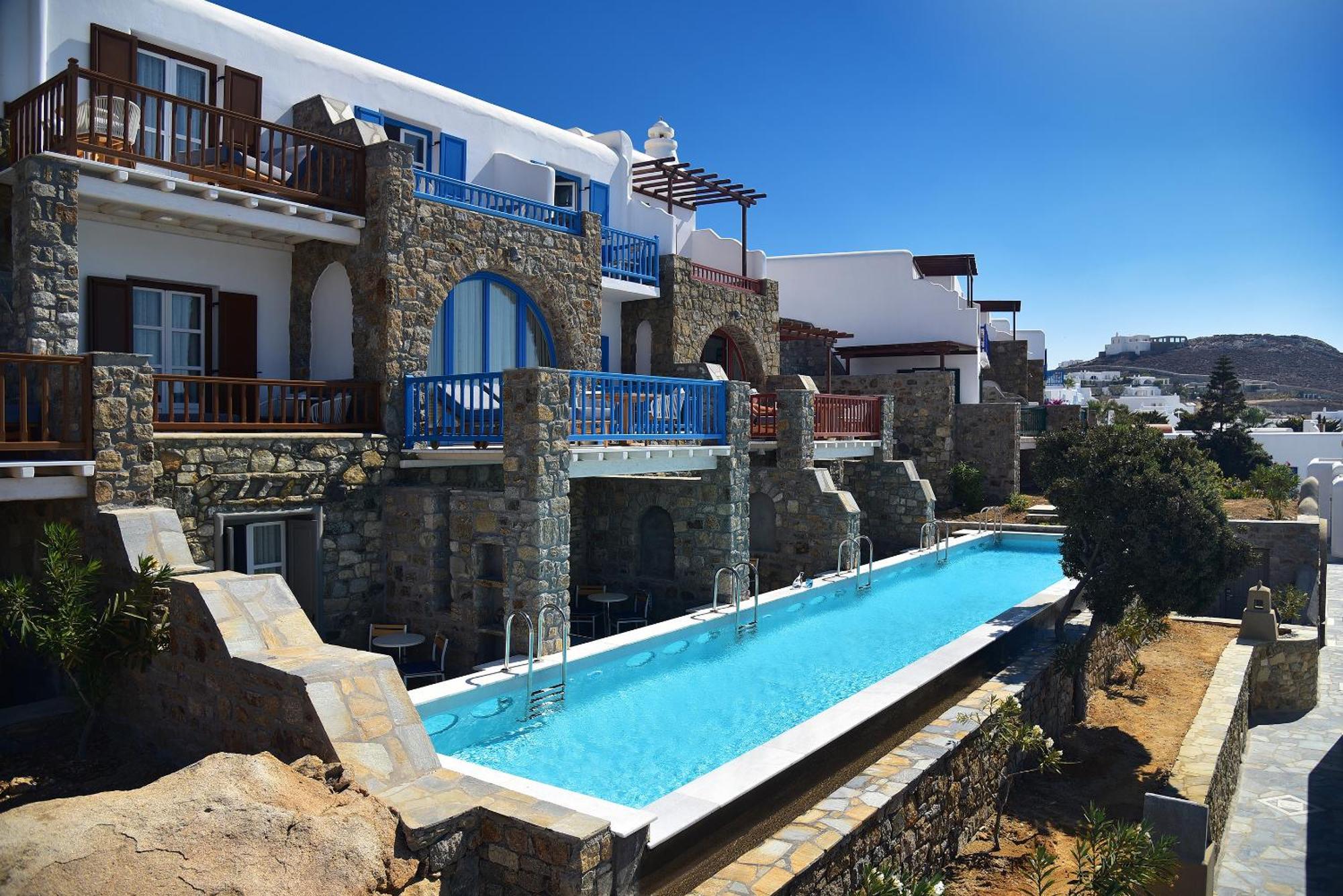 Habitación Premium con jardín y piscina compartida
